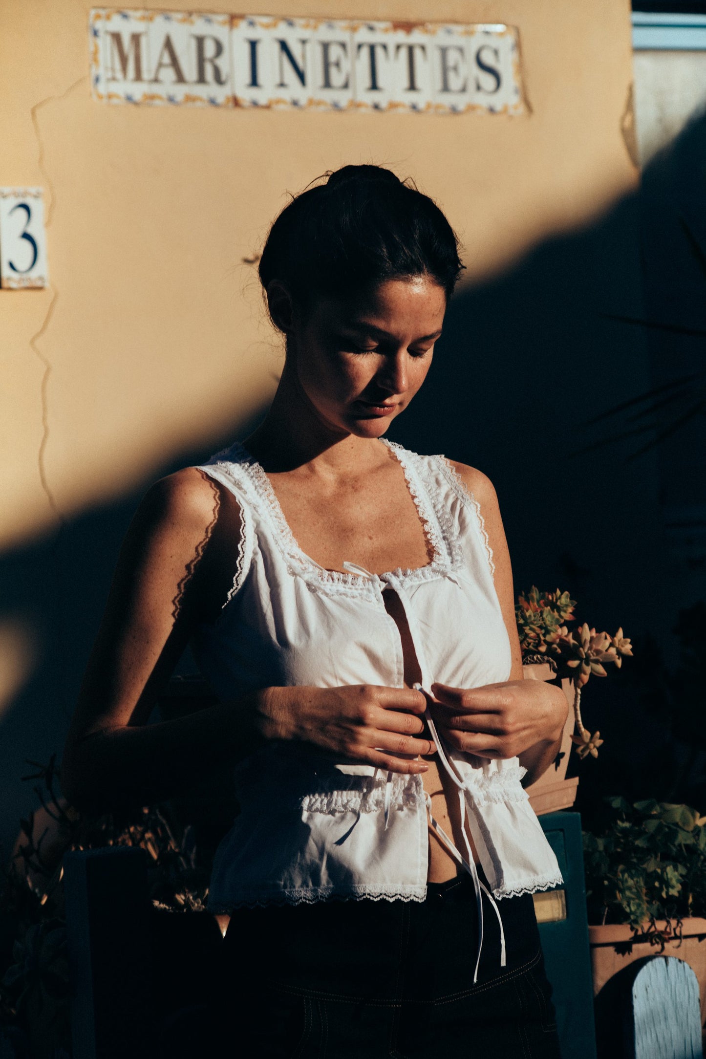 Rose sleeveless white cotton lace frilled top