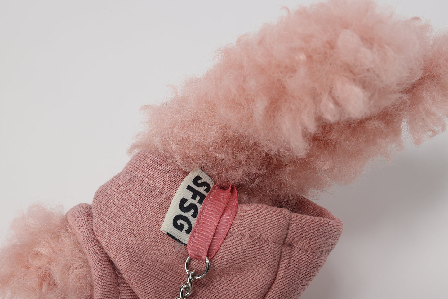 SFSG Pink scribbled puppy wearing a sweatshirt