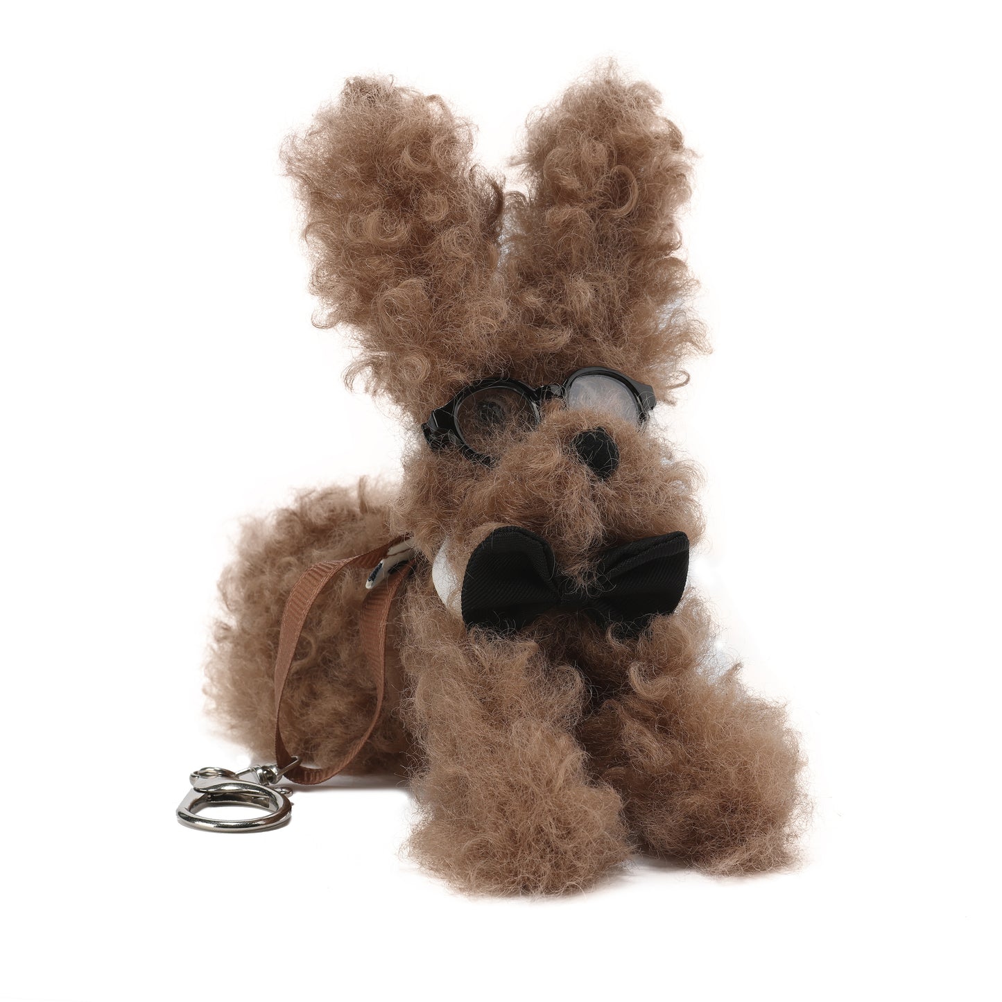 Chiot griffonné marron SFSG avec nœud papillon