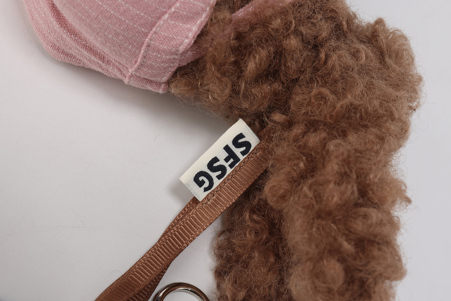 Pink striped overalls with brown scribbles puppy