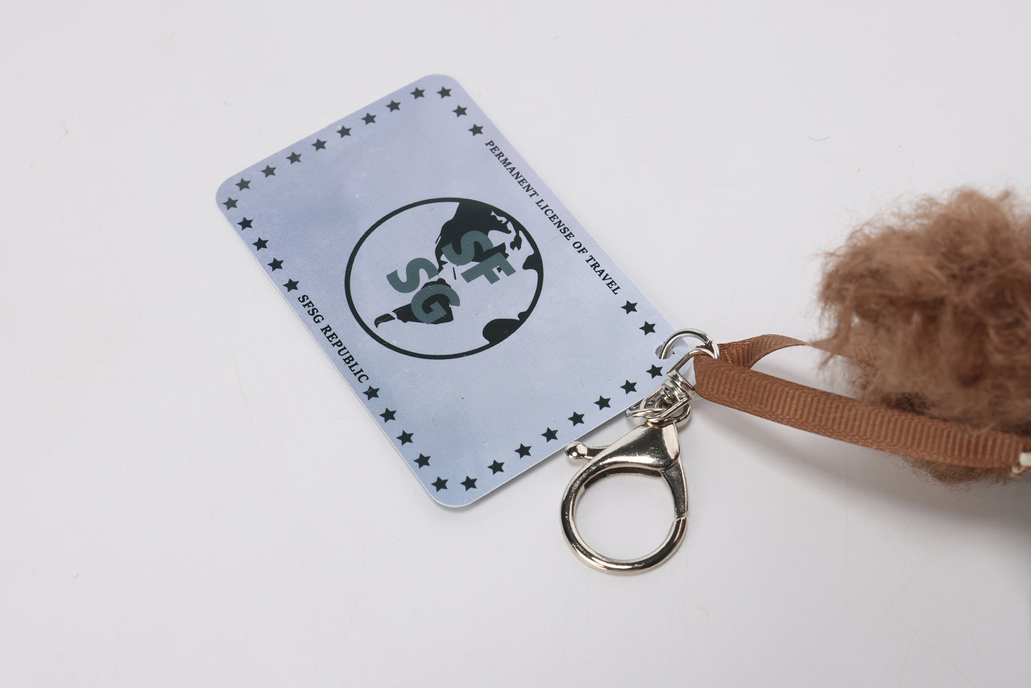 Sweat à capuche gris SFSG avec un chiot griffonné marron